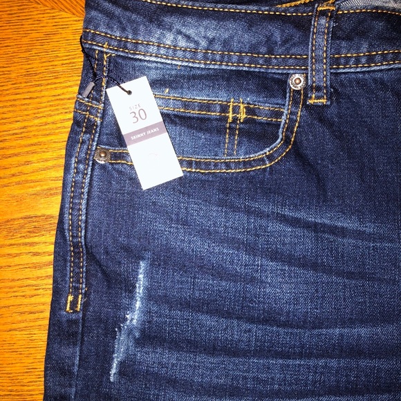 Distressed mid rise skinny jeans - Picture 2 of 4